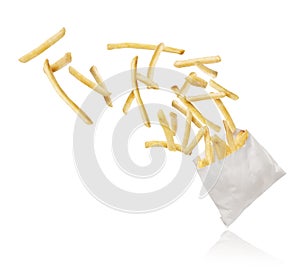 French fries flying out of paper packaging on white background