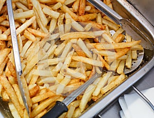 French fries fresh cooked. Restaurant deep fryer