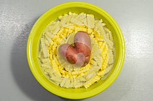 French fries with heart shaped potato