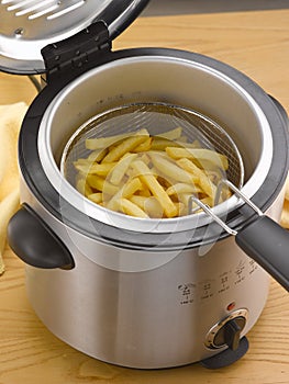 French fries into a home deep fryer