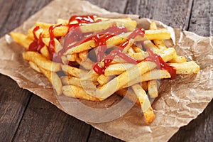 French fries with ketchup photo