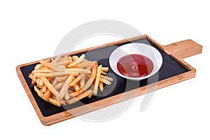 French fries with ketchup on a wooden board isolated on a white background