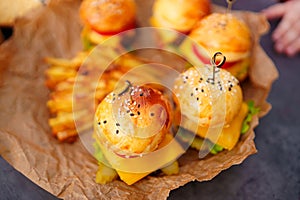 french fries and Mini burgers for a children's party or picnic.