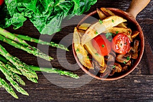 French fries with mushrooms and tomato, asparagus,lettuce