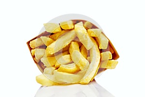 French fries in a package. Frontal view. Delicious junk food and quick snack. Close-up. White background with reflection