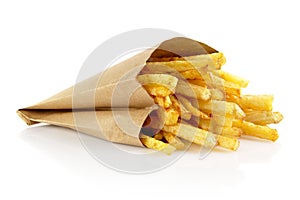 French fries in the paper bag isolated on white