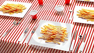 French fries or potato chips with Salted and ketchup. Yummy french fries in a paper cup with tasty. potato fry on white background