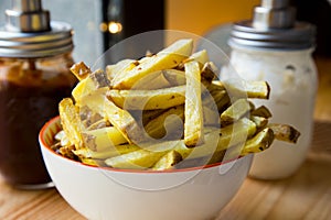 French Fries are potatoes that are made by cutting them into batons and frying them in hot oil until golden brown and crisp.