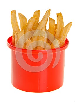 French Fries in red cup on background