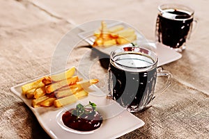 French fries and sauce dish with kvass