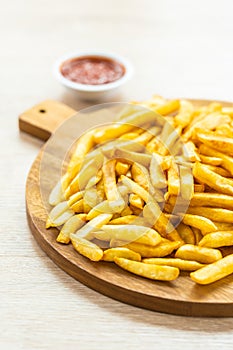 French fries with tomato or ketchup sauce