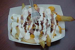 French fries with toppings