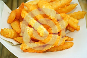 French fries on white papaer