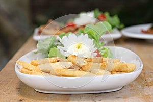 French fries on white plate