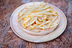French fries in the wood plate