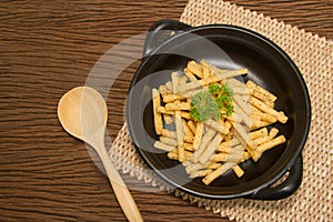 French fries on wooden table