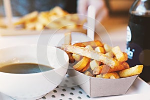 French fries on wooden table