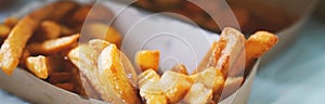 French fries on wooden table