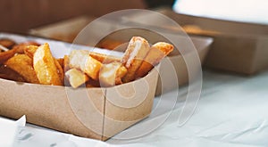 French fries on wooden table