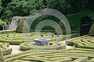 french garden in a medieval castle - france