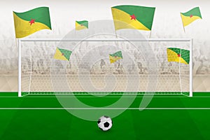 French Guiana football team fans with flags of French Guiana cheering on stadium, penalty kick concept in a soccer match