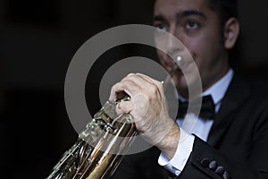 French horn instrument. Hands playing horn player