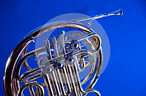 French Horn Isolated On BLue