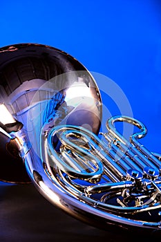 French Horn Isolated on Blue