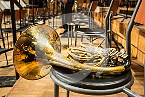 French horn lying on the chair