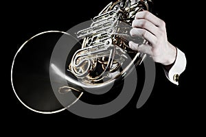 French horn player hands. Hornist playing brass music instruments