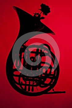 French Horn Silhouette on red