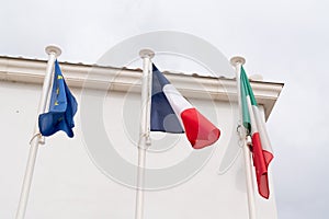 French italian europa EU flag on wall building symbol cooperation