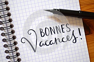 French language BONNES VACANCES! hand-lettered in notebook photo