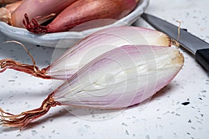 French long pink shallots grappe onion from Brittany, France