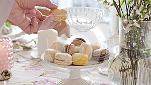 French macarons on a beautifully served table. Macaroons dessert close-up.