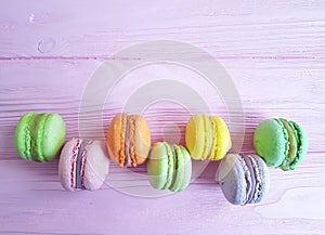 French macaroon vintage on a pink wooden sweet biscuit