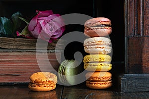 French macaroons  a book and a rose