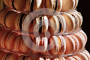 French macaroons. Candy bar. Wedding feast. Wedding sweets. beautiful macaron cake patisserie multi tier stand full of