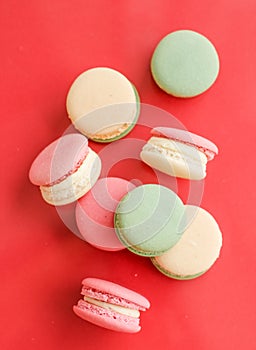 French macaroons on red background, parisian chic cafe dessert, sweet food and cake macaron for luxury confectionery brand,