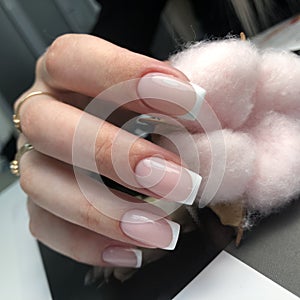 French manicure on the nails. French manicure design. Manicure gel nail polish