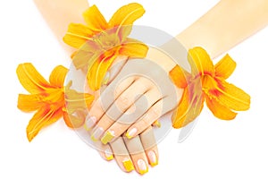 French manicure with orange lily. spa