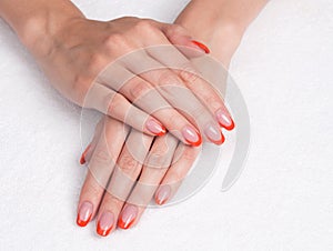 French manicure with orange tips