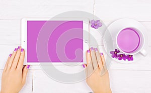 French manicure with violet flowers. spa