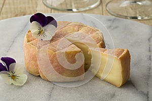 French Marc de Muscat cheese on a cheeseboard photo