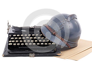 French military helmet of the First World War with old typewrite