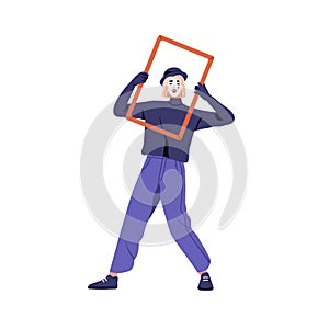 French mime, comic mimic actor, street performer. Happy silent dumb comedian performing pantomime, holding frame in