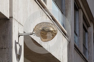 French notary sign above on office entrance photo