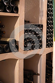 French oak wooden barrels for aging red wine in underground cellar, Saint-Emilion wine making region picking, cru class Merlot or