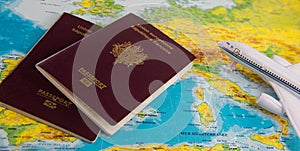 French passports on map and plane background