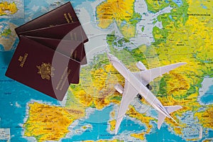 French passports on map and plane background